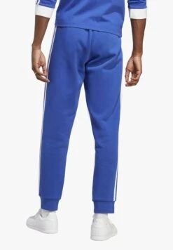 Adidas Originals Stripes Pant Unisex - Pantalon De Survêtement - Semi Lucid Blue -ASOS 26e7757a6b5c4cb6adf6055da9adb68b