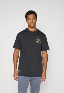 Adidas Originals MANCHESTER UNITED ICON GRAPHIC T-SHIRT - Article De Supporter D'équipe De Club - Black -ASOS 4789bc9fc9f7428b9d219529b5aca7d0