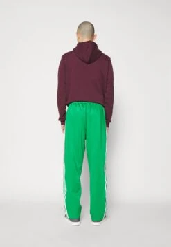 Adidas Originals Wide Unisex - Pantalon De Survêtement - Green -ASOS 77454fa03bc8455eb27b604fcd009397