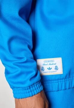 Adidas Originals REAL MADRID ICON - Article De Supporter D'équipe De Club - Blue Bird White -ASOS 801a5efe650d4d3080e3e92dc8fc62a8