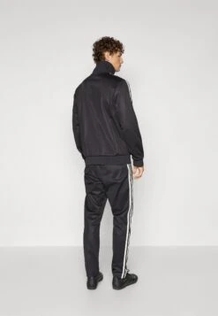 Adidas Originals GERMANY 125 ANNIVERSARY TRACKPANTS - Article De Supporter D'équipe Nationale - Black -ASOS c176cdbf1d444ff7a9120287d1d2a99c