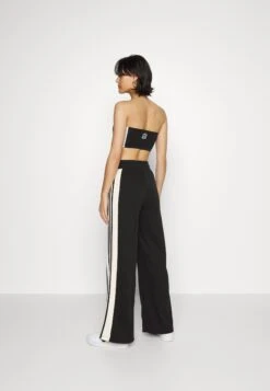 Adidas Originals Wide Leg - Pantalon De Survêtement - Black -ASOS d96ff92bb2474ef589354a9e0e23a9c8