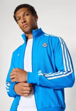 Adidas Originals REAL MADRID ICON TRACK TOP - Article De Supporter D'équipe De Club - Bluebird/white 9 Adidas Originals REAL MADRID ICON TRACK TOP - Article De Supporter D'équipe De Club - Bluebird/white -ASOS e2d1431b23b14be5a31e818df88389c0