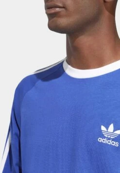 Adidas Originals 3-Stripes Ls T - T-Shirt À Manches Longues - Semi Lucid Blue -ASOS f2225bf0121f4a7c94bb06ef60ca7913